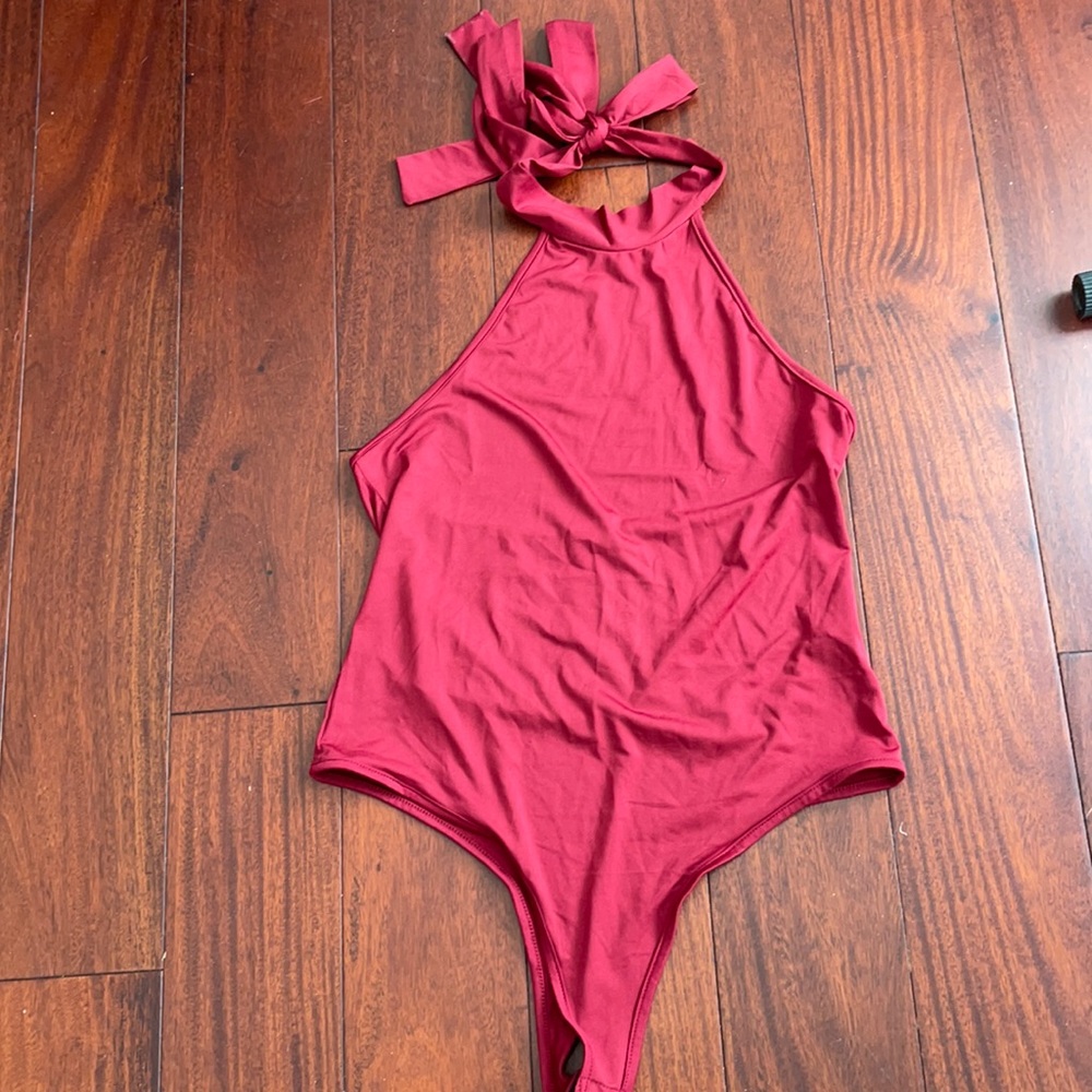 Made in china . Size M  . Color dark red